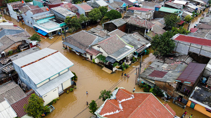 Aerial POV view Depiction of flooding. devastation wrought after massive natural disasters at Bekasi - Indonesia - obrazy, fototapety, plakaty