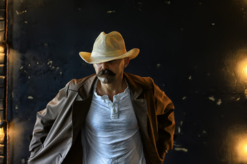 stylized vintage portrait of a man wild west, mustachioed dangerous criminal, mustache on his face