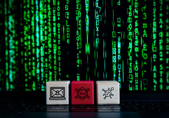 Computer cyber hacker concept with wooden blocks and malware, virus and black hat hacking icons -...