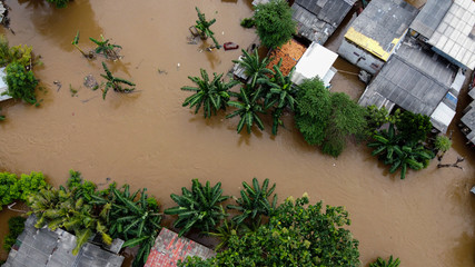 Aerial POV view Depiction of flooding. devastation wrought after massive natural disasters at Bekasi - Indonesia