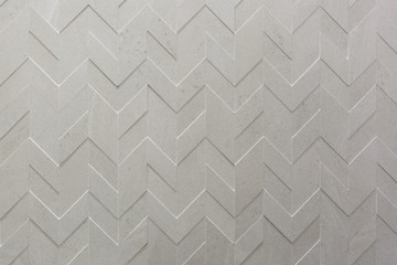 Beige wall tiles. Rectangular patterns.