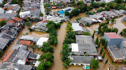 Aerial POV view Depiction of flooding. devastation wrought after massive natural disasters at Bekasi - Indonesia