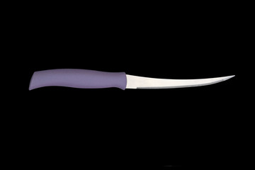 Kitchen knife with colored handle isolated  on black background