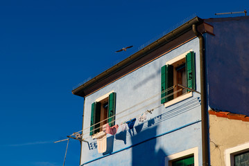 Burano island, famous for its colorful fishermen's houses, in Venice, Italy
