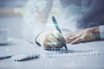 Financial trading chart multi exposure with man desktop background.