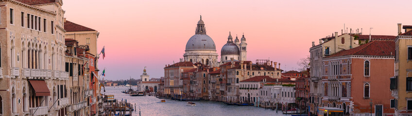 Naklejka na ściany i meble Grand Canal with Santa Maria della Salute at background at sunset time, Venice, Italy