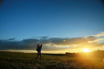 traveler man in the field, happy guy, concept freedom leisure nature, landscape beautiful place nature