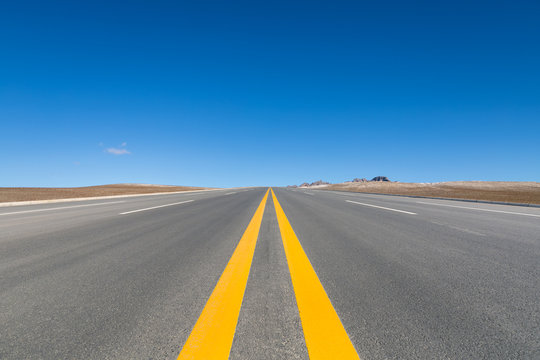 Road And Pure Blue Sky