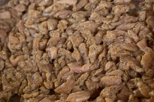 Raw spiced meat on plate