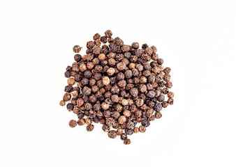Small pile of black pepper isolated on white background.