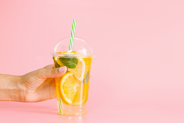 Glass of fresh orange juice with mint. Top view