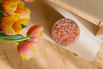 Himalayan salt. Bath salt. Spa treatment. The concept of the beauty and relaxation Industry. Bath of crystals in a transparent jar. The view from the top. Space for text.