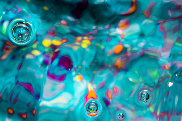 Water waves and colourful bubbles splashes flat lay