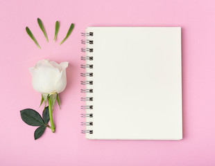 Empty copy space notepad with beautiful rose