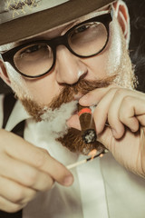 man smoking a cigar