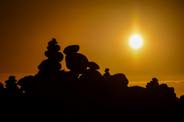 Stack of stones on the sea beach