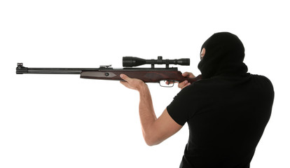 Professional killer with sniper rifle on white background