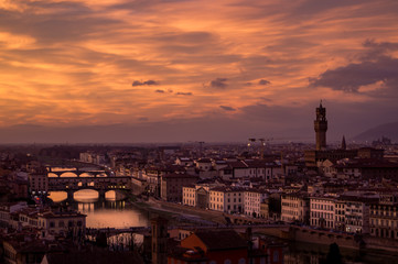 An intense red and purple sunset over florence