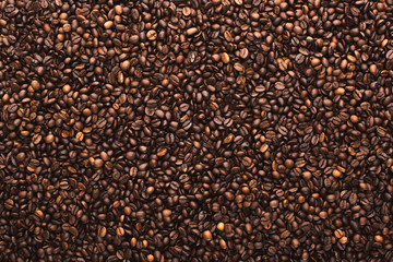 top view of fresh roasted coffee beans background