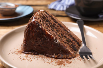 Delicious chocolate cake on table, closeup view