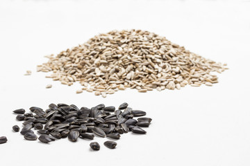Peeled and unpeeled sunflower seeds. Natural source of iodine and calcium. natural source of iodine and calcium