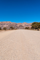 The unpaved country road C14, connecting Windhoek with Sesriem, in Western Namibia.