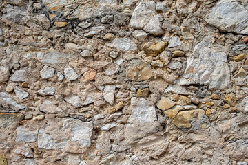 Mauer aus Feldsteinen als Hintergrund