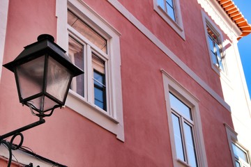 Old colorful typical facade next to the water canal in Aveiro village in Porto