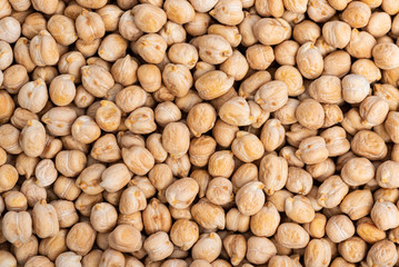 Dried Chickpeas background, healthy food used in soups. Naturally preserved legumes with long shelf life.