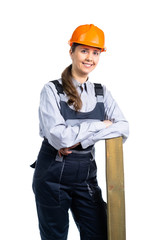 Girl builder with a wooden board in her hands. isolated