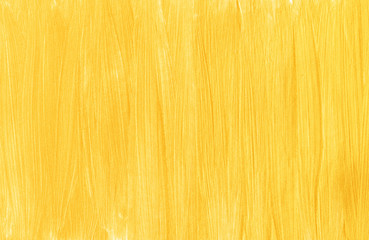 Naklejka premium Brush strokes of gold paint, vertical stripes. Abstract modern trendy golden texture background