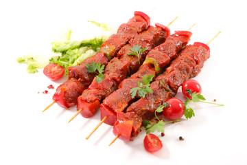 beef barbecue on stick with tomato isolated on white background