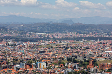Fototapeta na wymiar View of the city of Cuenca, Ecuador, with it's many churches at sunny summer day. South America.
