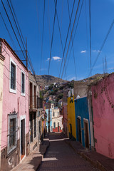 Colored colonial houses in old town of Guanajuato. Colorful alleys and narrow streets in Guanajuato city, Mexico. Spanish Colonial Style.