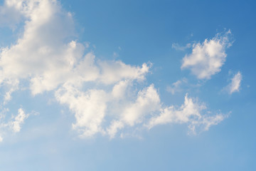 Blue sky with fluffy white cloud, Nature background	