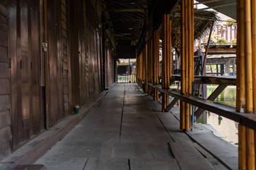 Fototapeta na wymiar Front yard Ayutthaya's ancient wooden houses