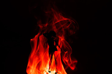 Figure of a Woman dancing in Fire