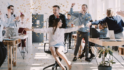 RED EPIC-W Happy fun young brunette business woman celebrating birthday at party with office colleagues slow motion.