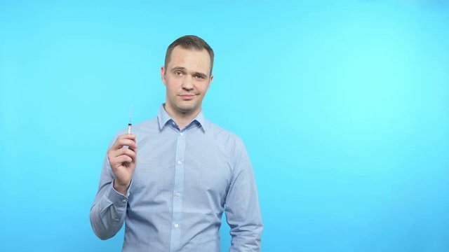 a man shows a syringe, comes death. blue background. the sketch