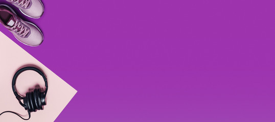 Sports equipment and shoes for women's training. Pink-purple web-banner, diagonal composition.