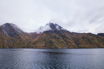 mountains at autumn in fjord