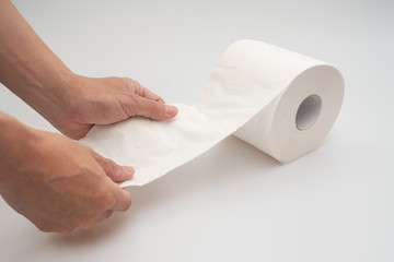  Asian hand holding toilet paper