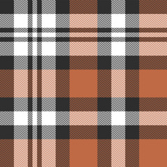 Seamless tartan plaid pattern texture. Herringbone woven pixel check plaid in orange, brown, and white for autumn winter scarf, blanket, throw, duvet cover, or other fashion textile print.