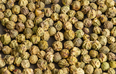 Close up of Green pepper. Green peppercorn macro background.