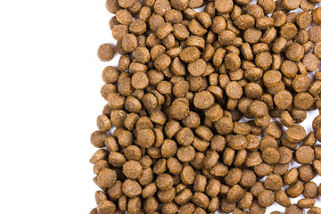 Dry cat food isolated on white background close-up top view