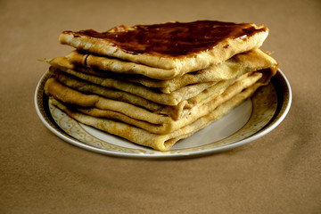 Homemade pancakes, milk pancakes on a plate.