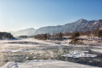 Winter landscape. Katun river in Altai on a sunny day. Russia