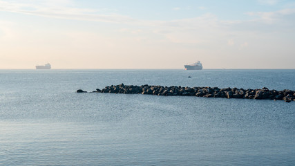 Oil tanker ship at blue sea, Italy
