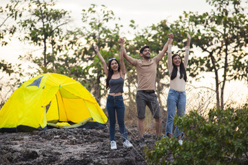 Group of Friends happy backpacks camping with tent in forest ,travel concept, Cheerful Concept.
