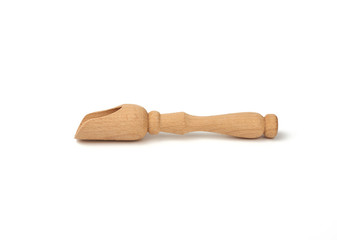 new wooden scoop for bulk products and spices isolated on a white background